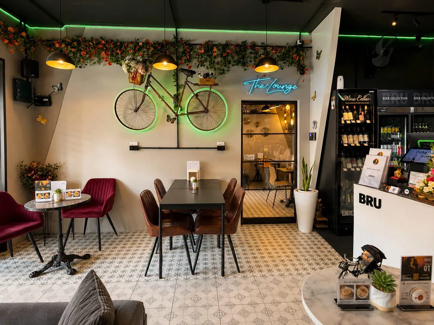 Seating area beside the vintage bicycle wall feature at BRU Pattaya